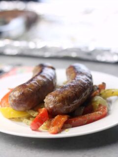 Sausage, Peppers, and Onions served on a plate.