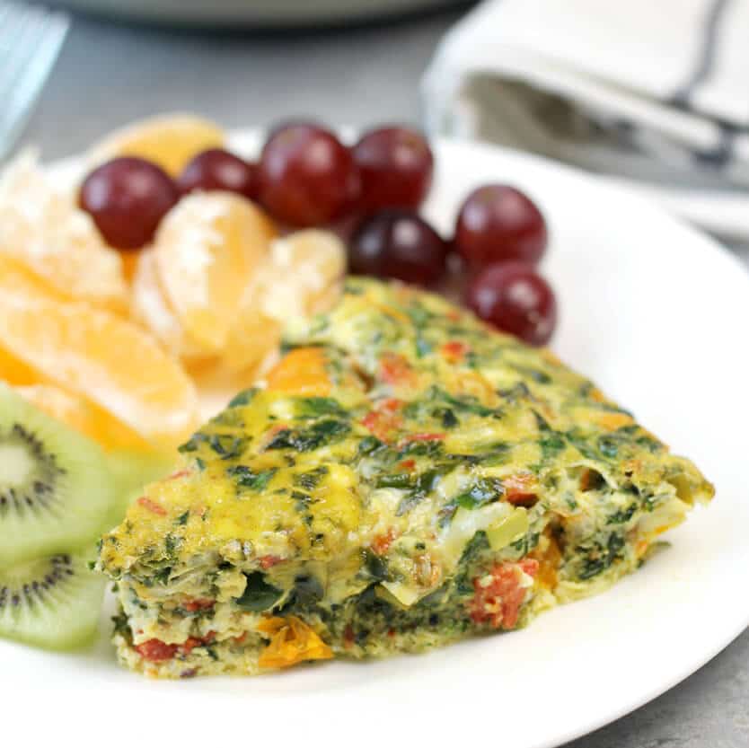 Easy Crustless Quiche Recipe made with spinach, peppers, onion--or whatever vegetables you have on hand! It's simple and keeps for days in the fridge.