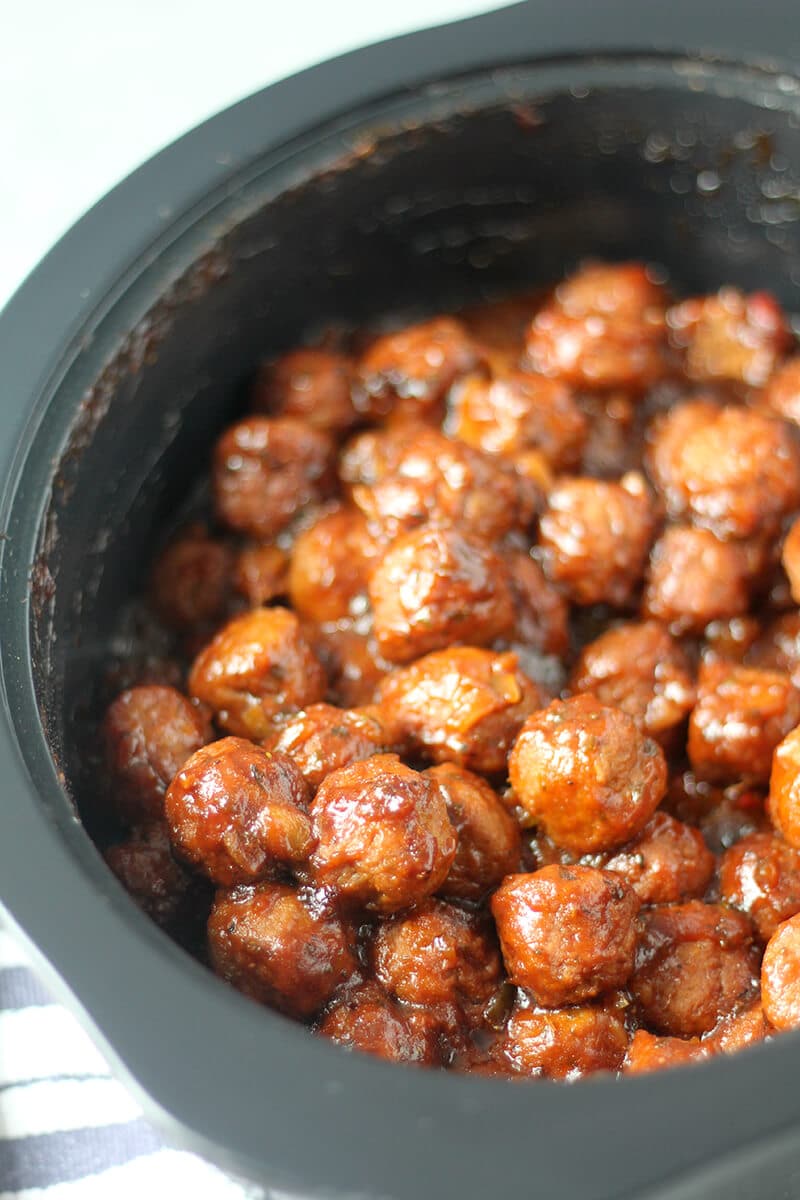 Overhead shot of slow cooker barbecue meatballs in crockpot.