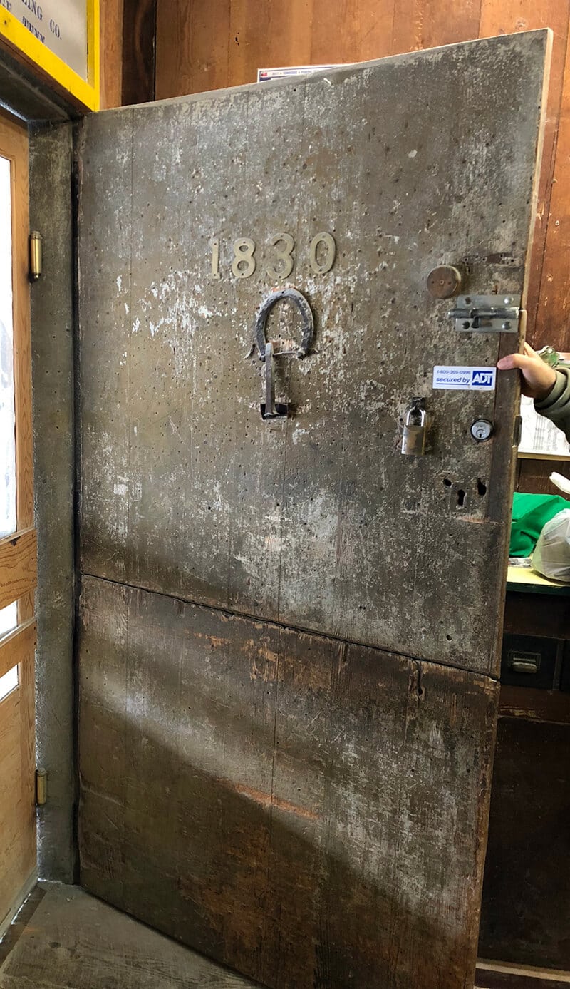 The exterior door to the Old Mill Pigeon Forge, which was used as a town bulletin board.