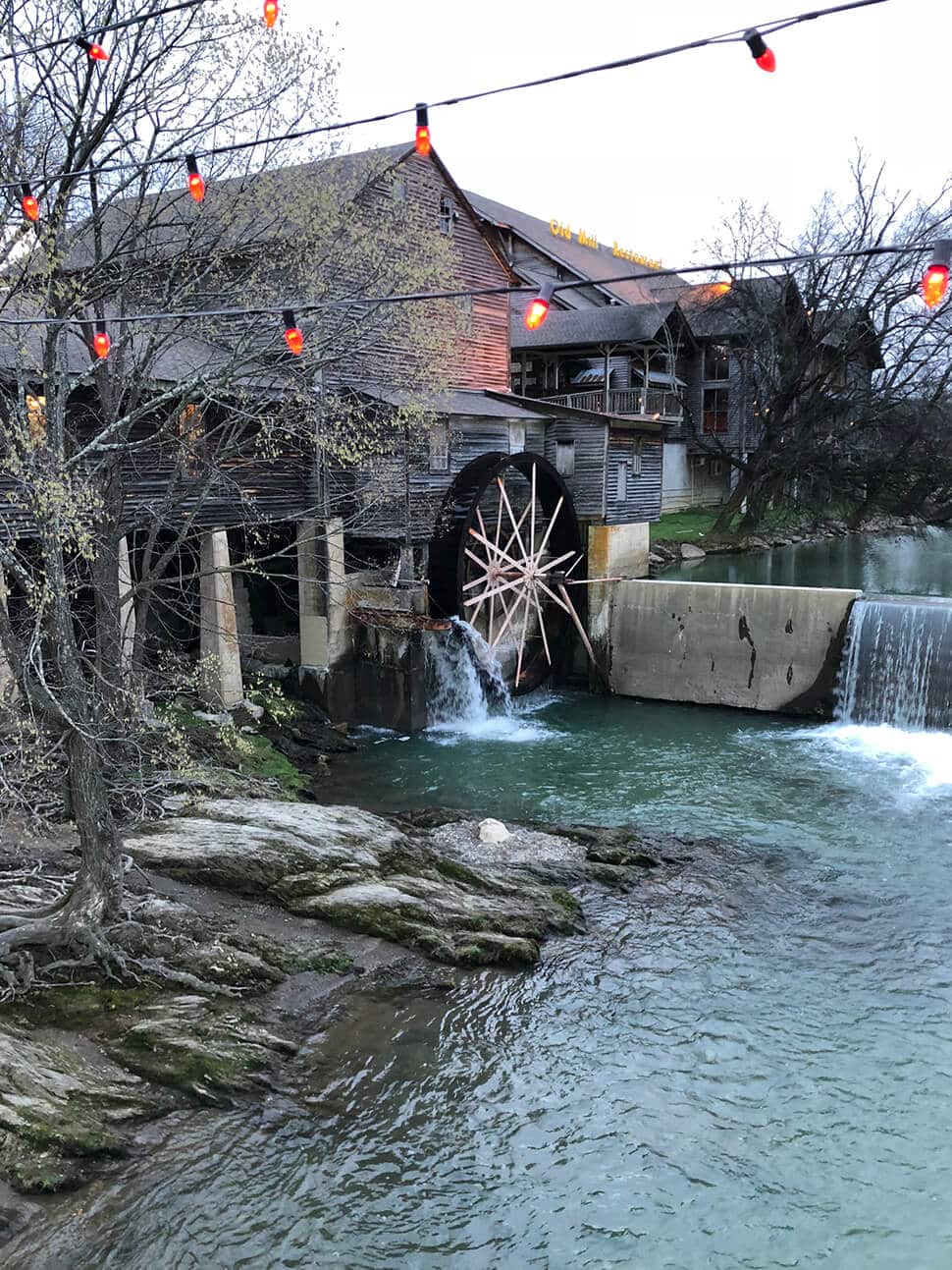 The old water wheel in the river outside the Old Mill Restaurant in Pigeon Forge.