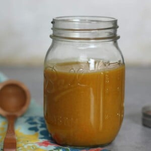A jar of honey mustard sauce.