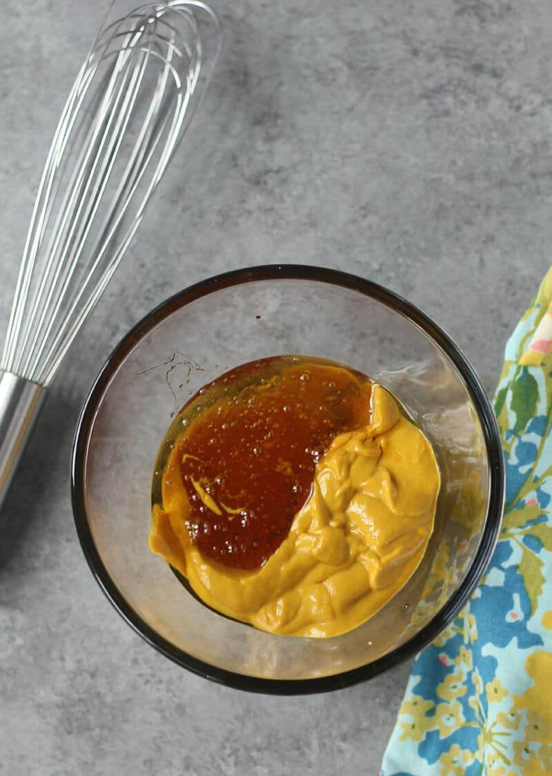 A bowl of ingredients to make Honey Mustard Sauce Recipe.