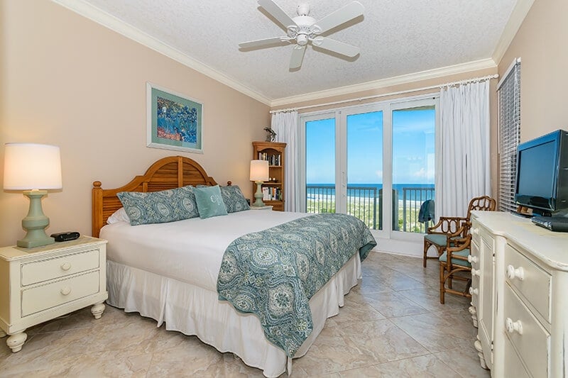 The master bedroom and balcony view from Amelia Island rental. 