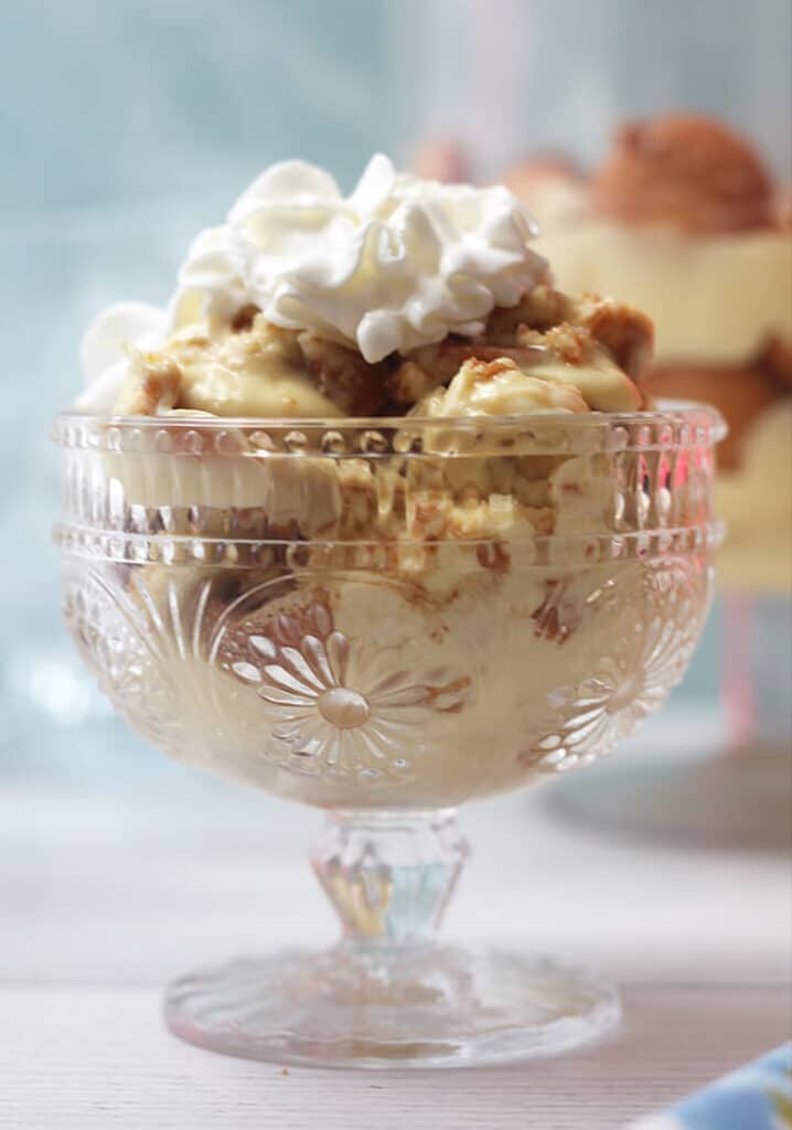 A serving of Southern Banana Pudding in a clear dessert dish.