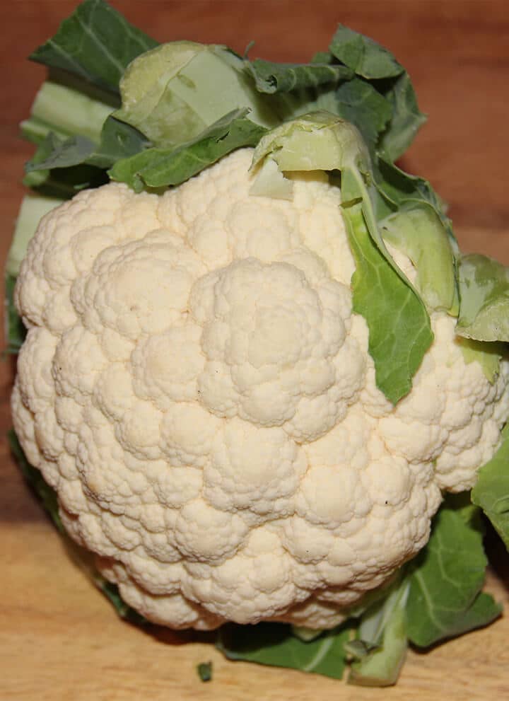 A head of cauliflower to cut and roast.