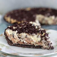Chocolate Chip Cheesecake with mini chocolate chips is the easiest cheesecake! No springform pan needed and it whips up in about 15 minutes!