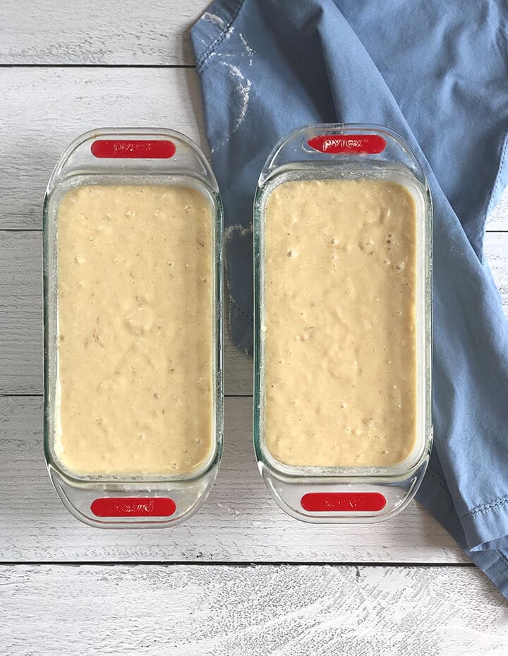 Banana bread batter in loaf pans ready to bake.