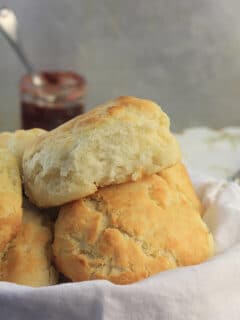 A basket of baked Southern style biscuits.