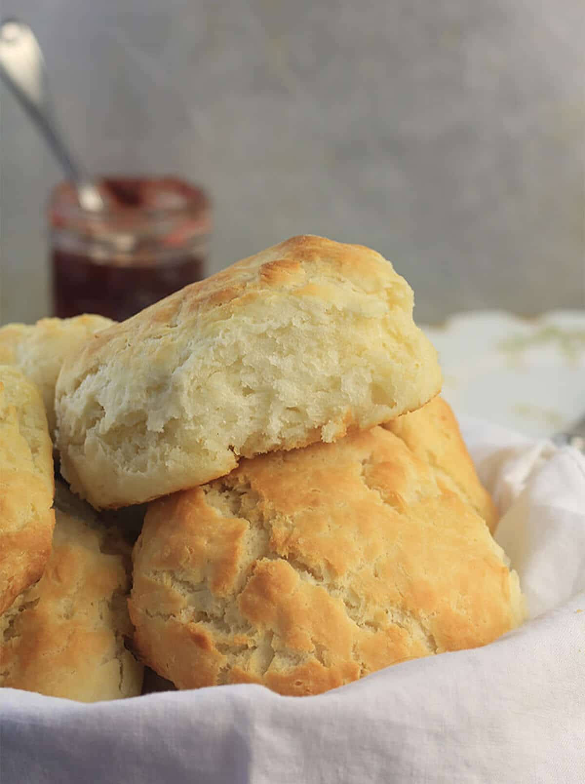 A basket of baked Southern style biscuits.