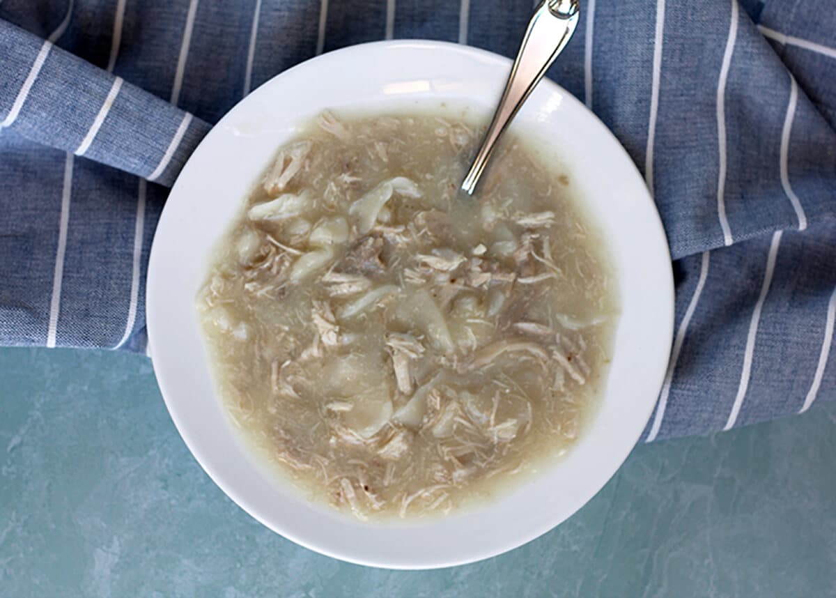 Southern Chicken and Dumplings are made with flour and butter, chicken, and broth, and that's it! This is a classic, simple dish and it's the ultimate comfort food!