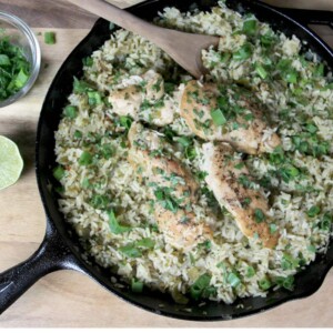 Gluten free chicken and rice in a cast iron skillet.