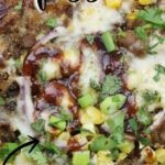 BBQ Pork Pizza with Roasted Corn, Jalapeno, and Smoked Mozzarella is super easy using leftover bbq pork. This BBQ Pork Pizza pops with flavor and is a great addition to a weekly meal plan.