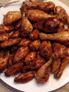 Honey Baked Chicken Wings on a white plate.