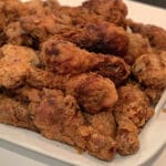 Southern Fried Chicken made the simple, old-fashioned way it used to be made. Just sprinkle the chicken with salt and pepper, dredge in flour, and fry! So easy!