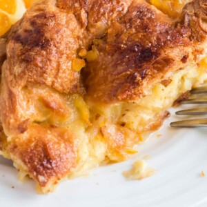 Croissant breakfast casserole made with orange marmalade, eggs, and cream—luscious, and super easy. Prepare ahead and bake in the morning!