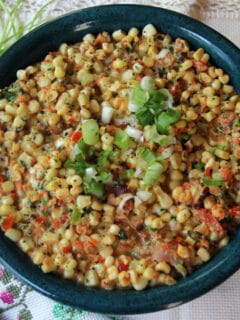 Jalapeno creamed corn with bacon, scallions, and cilantro is a great side dish for taco night, burgers on the grill, or slow-roasted pork. This cream style corn is a little spicy and everyone loves it!