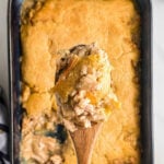 Chicken pie with no vegetables, just shredded chicken and a buttery crust. This is an old-fashioned chicken pie recipe that's easy to make and tastes great. It's also good for potluck dinner or transporting to someone in need.