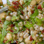 Farro Salad with arugula, herbs, and sun-dried tomatoes is bursting with fresh flavors. You'll want this salad all year long!