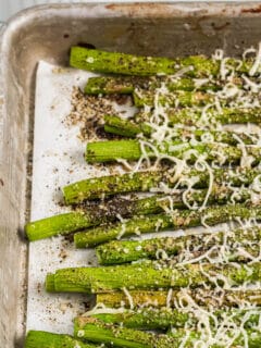 A baking sheet with parmesan roasted asparagus.