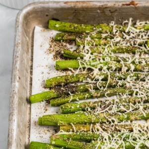 A baking sheet with parmesan roasted asparagus.