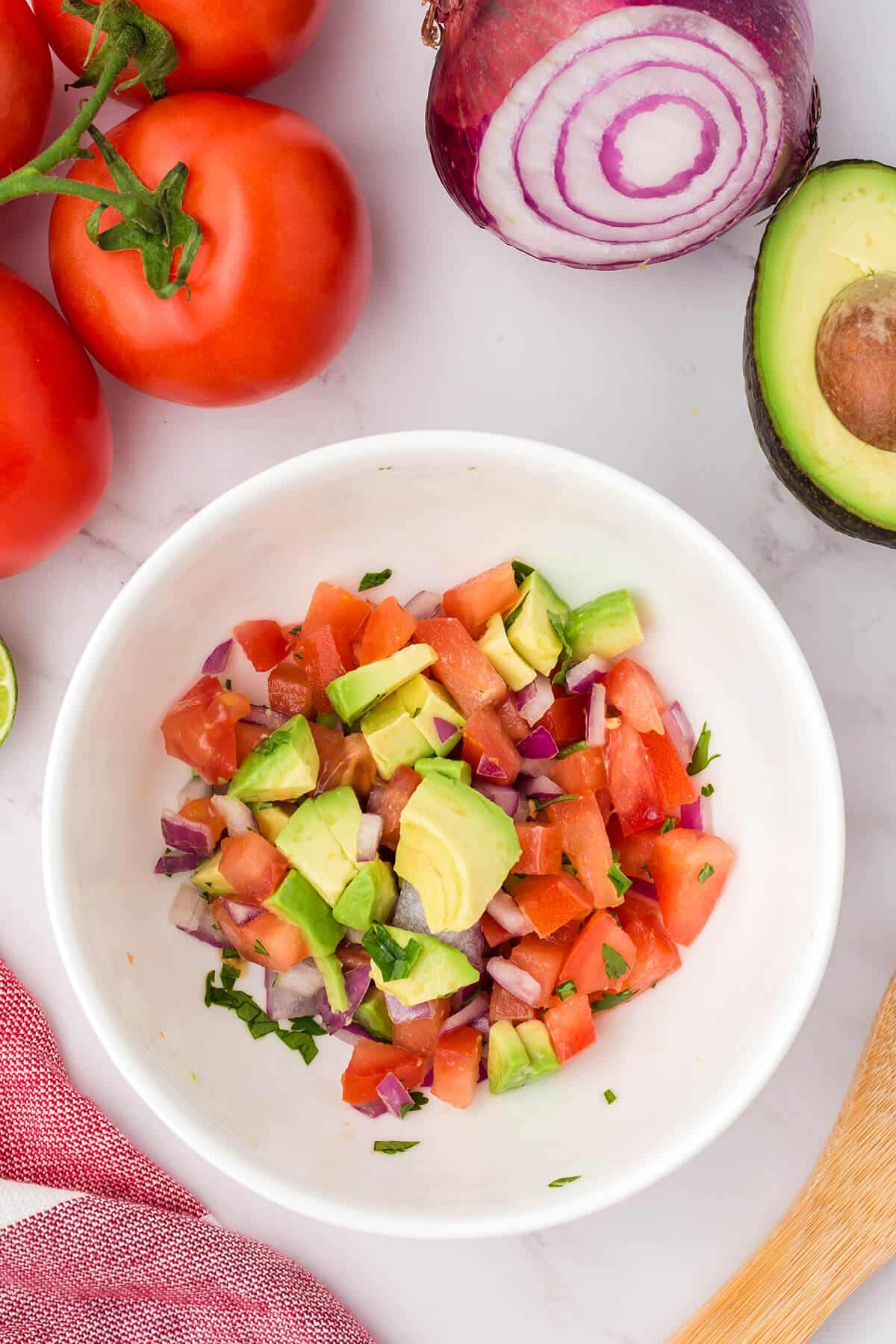 ingredients for avocado salsa in bowl