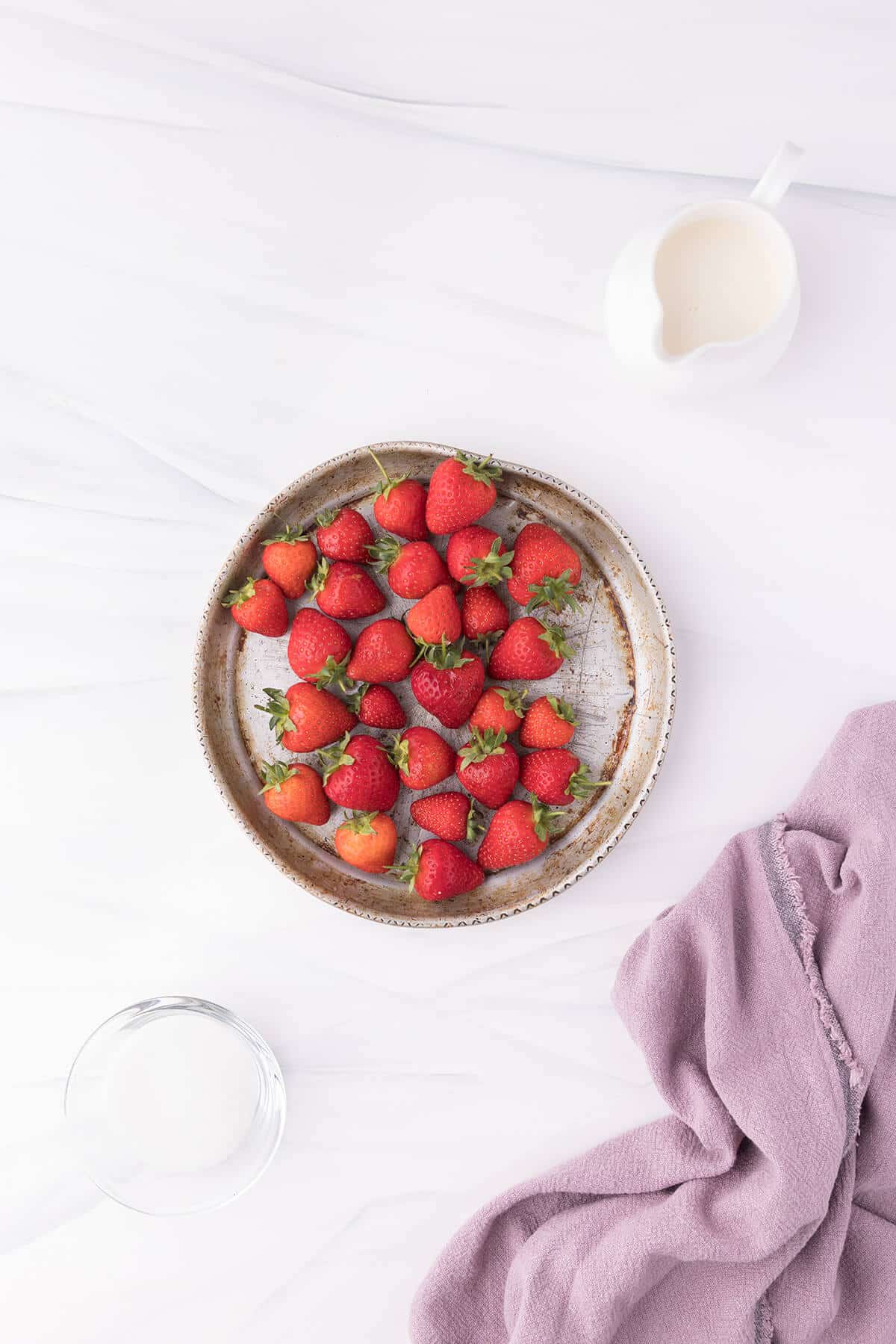 Plate filled with fresh strawberries