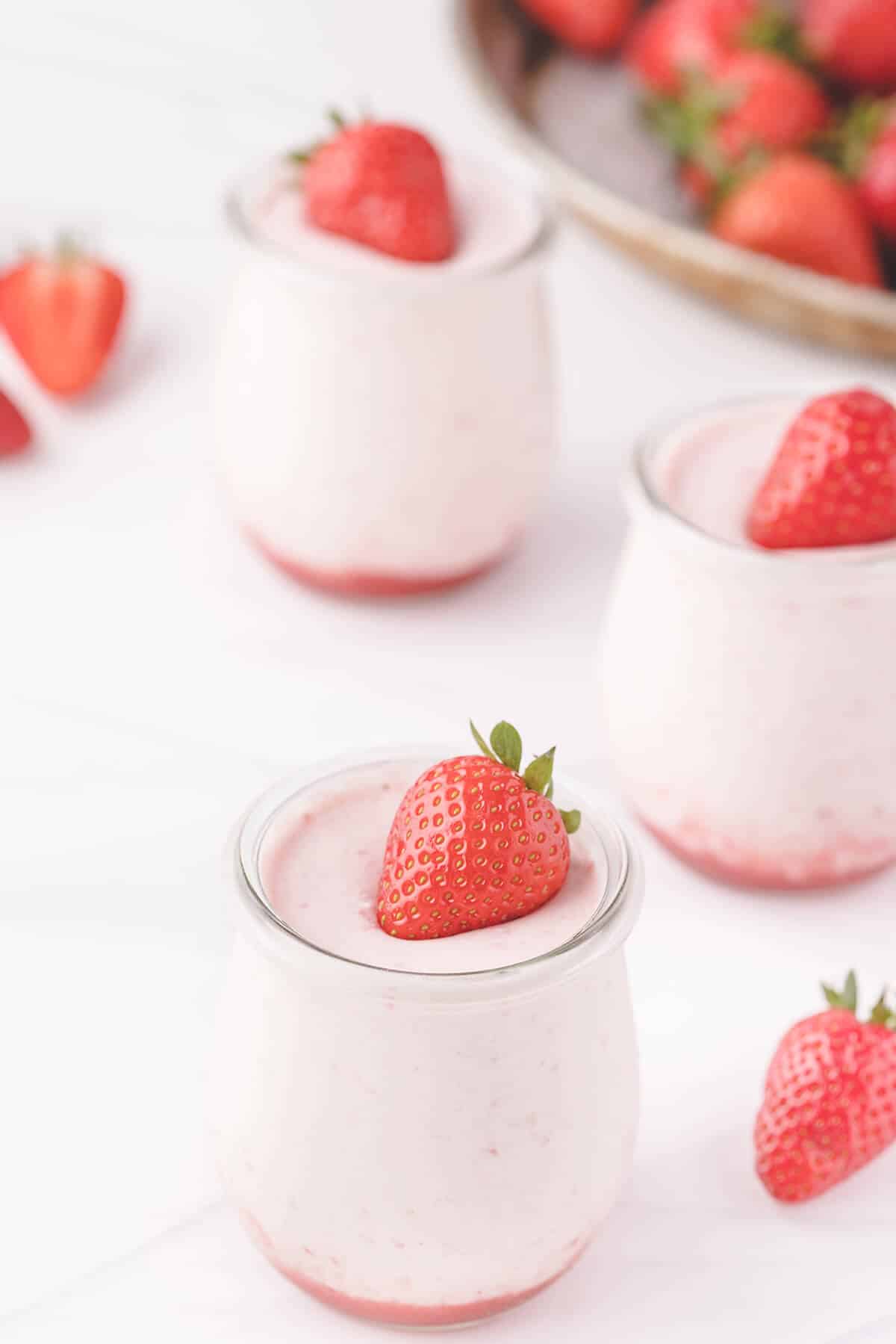 small jars of strawberry mousse