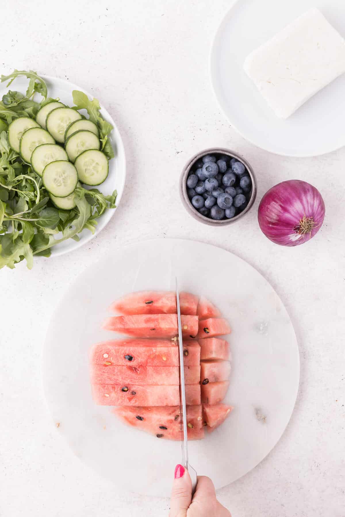 dicing up the fresh watermelon