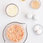 bowls of chopped onion canned salmon and bread crumbs