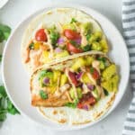 salmon tacos on warm flour tortillas