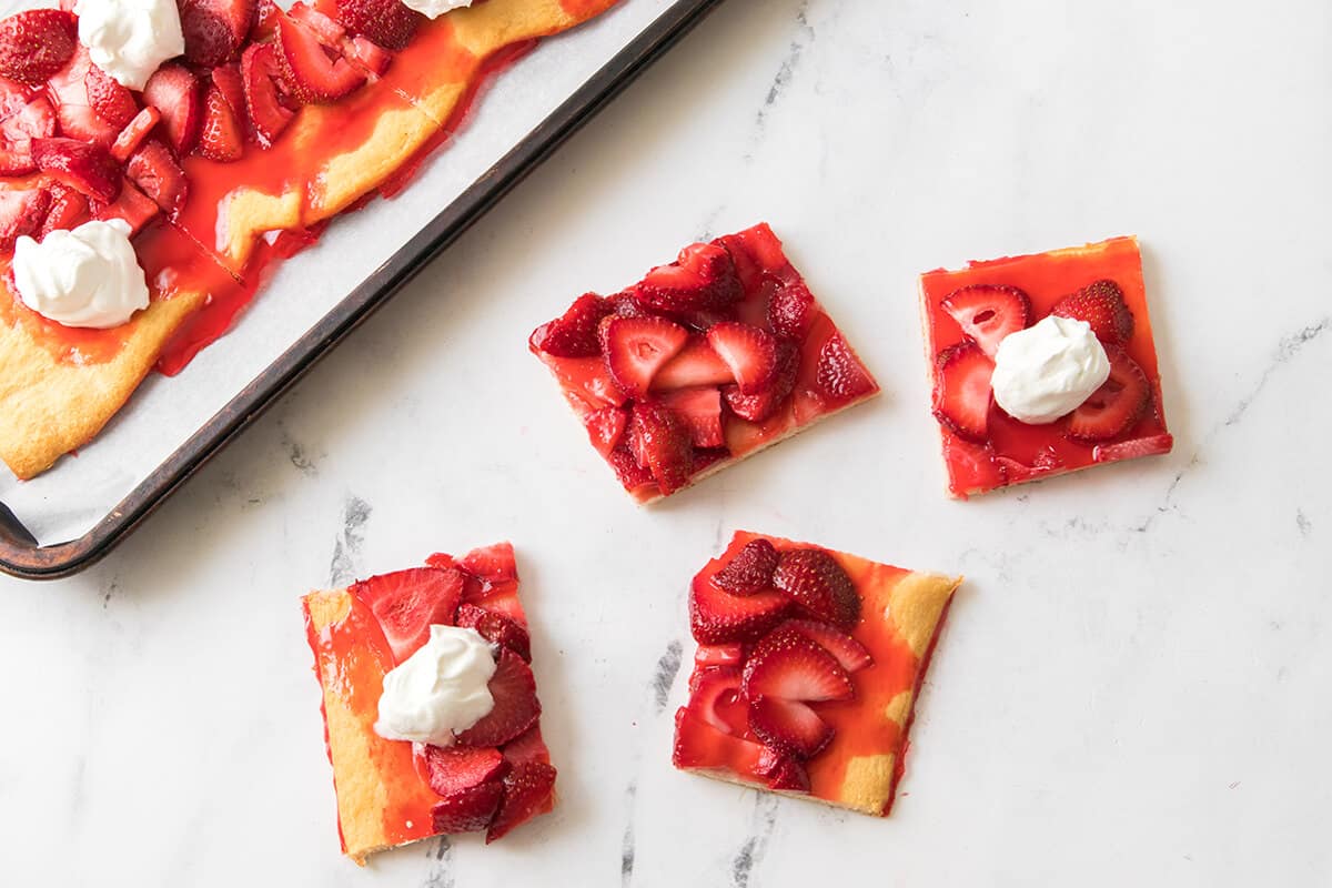 cut squares of strawberry pizza 