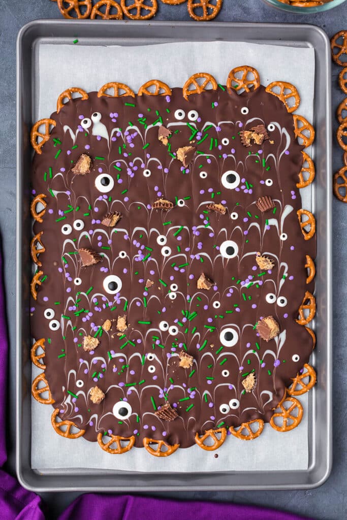 solid halloween pretzel bark on a baking sheet
