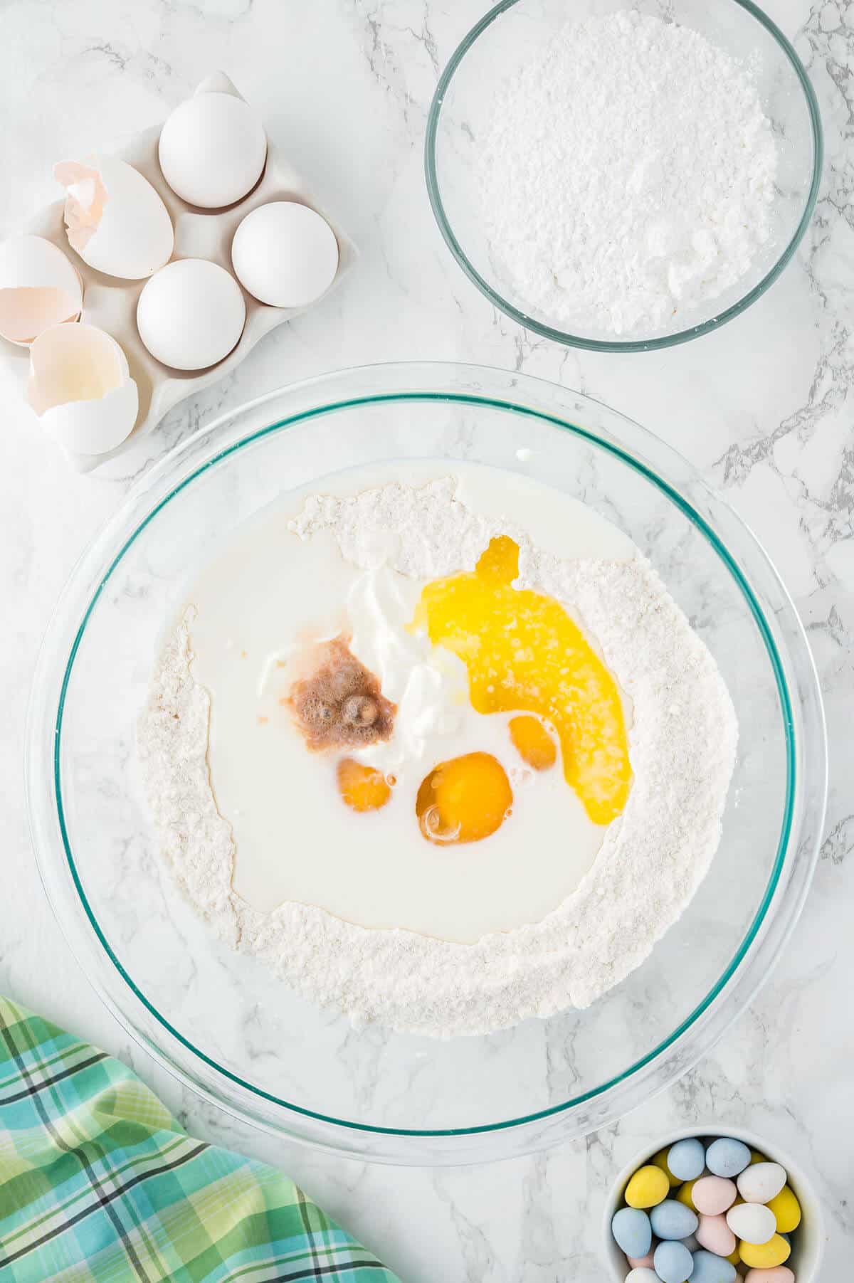 Bowl of cake mix and eggs.