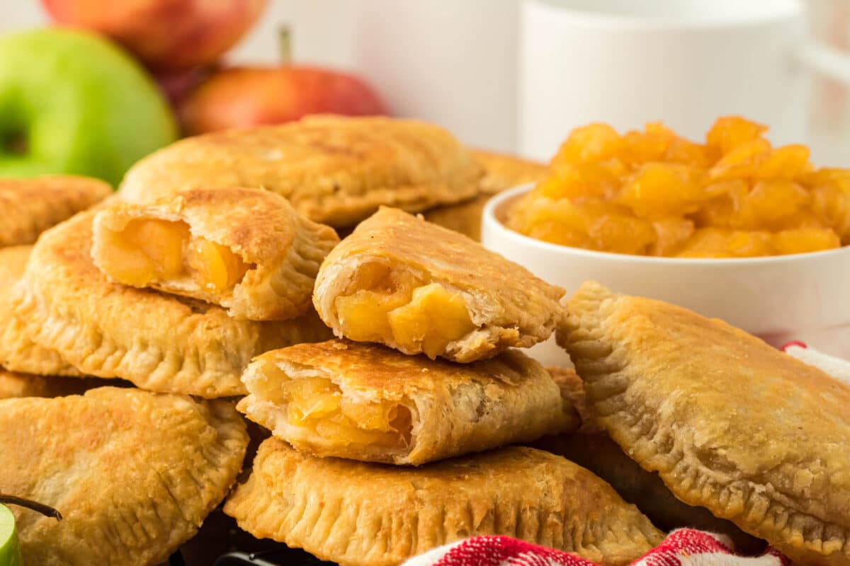 A fried apple pie cut in half.