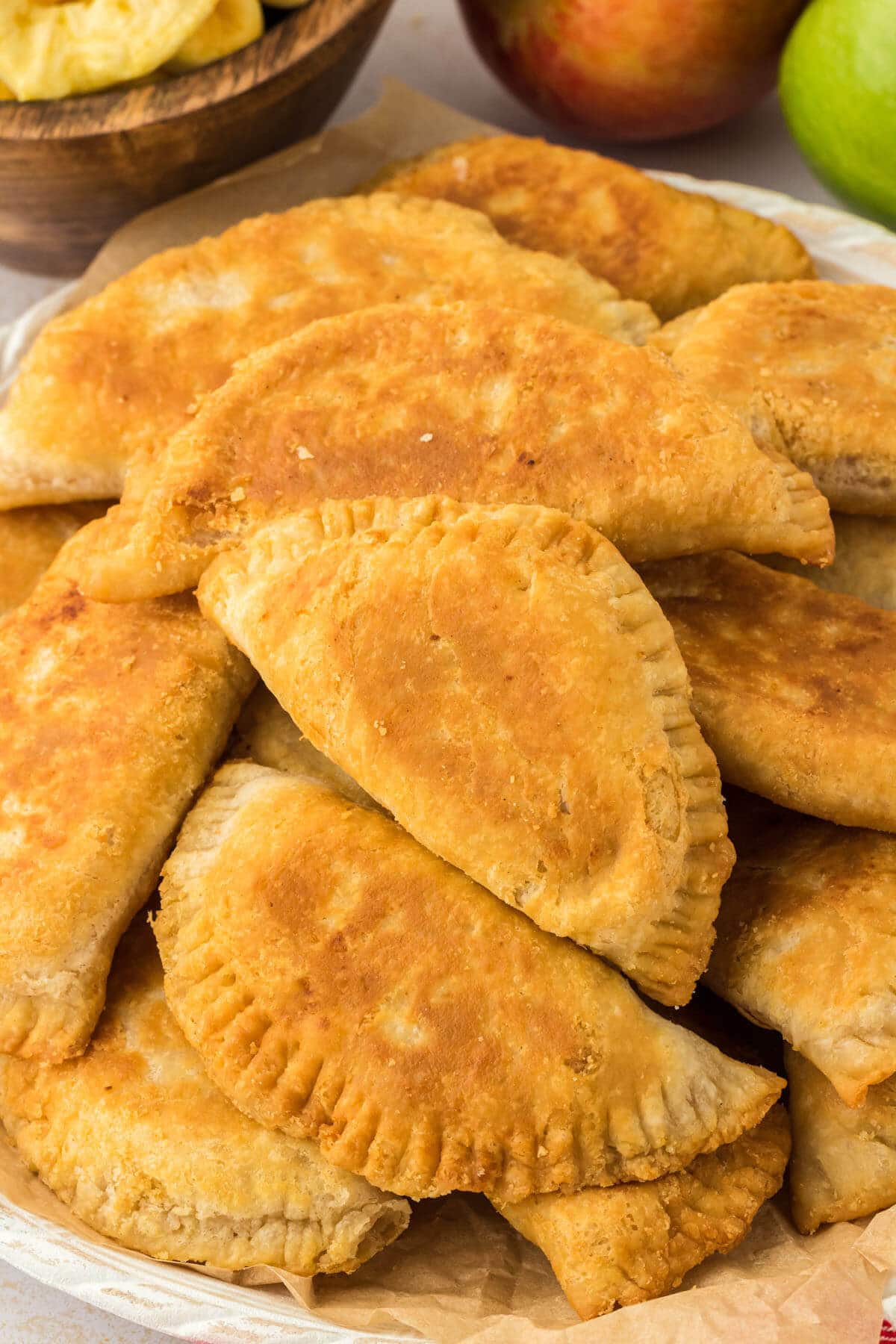 A platter of fried apple pies.