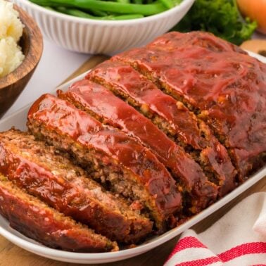 A baked meatloaf on a platter.