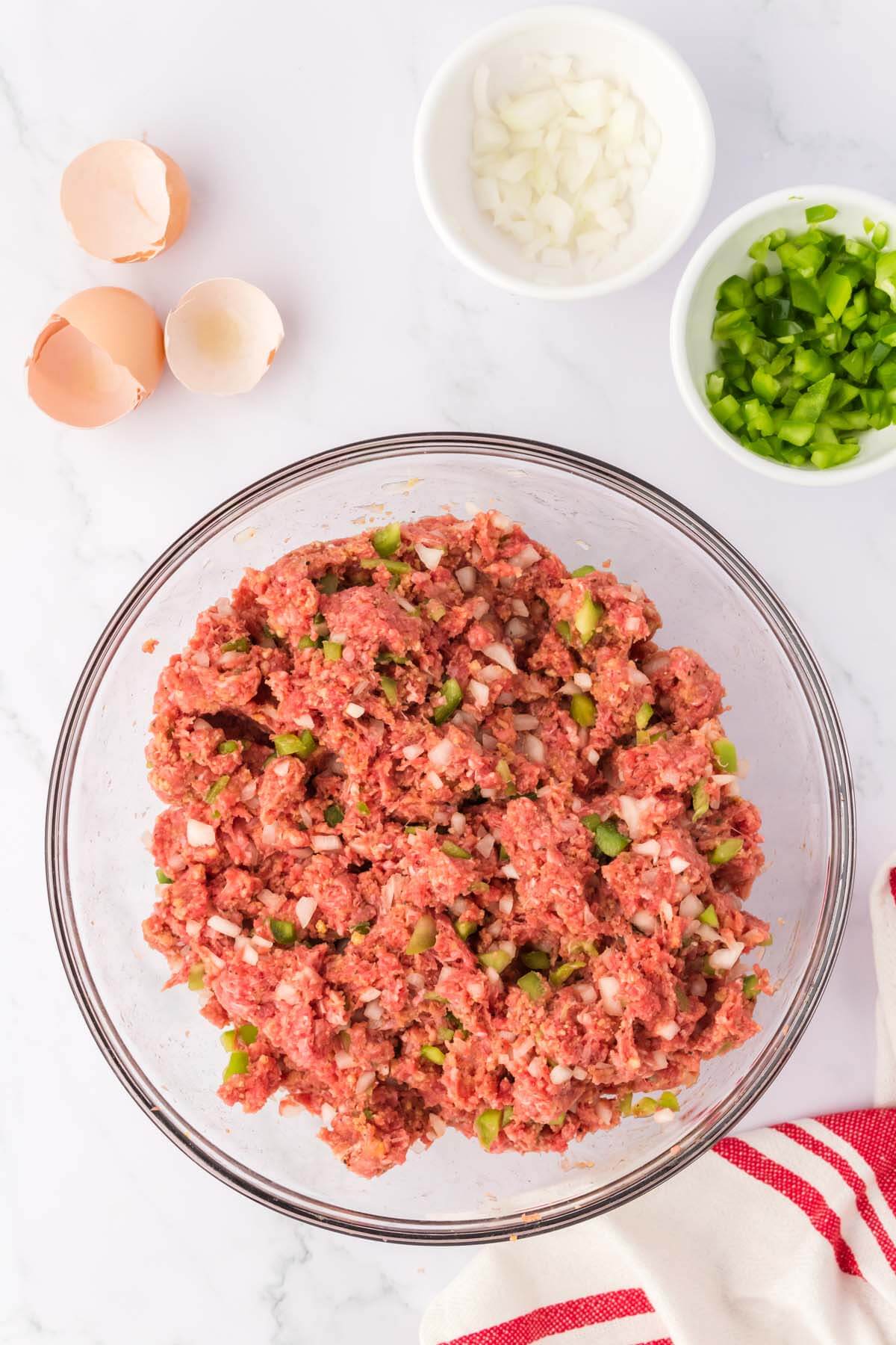 Ground hamburger meat in a bowl.
