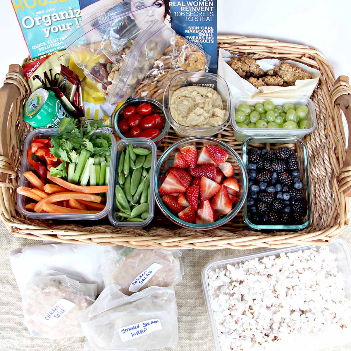 A road trip gift basket filled with snacks.