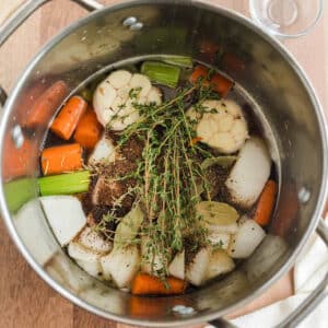 A large stockpot filled with turkey brine.