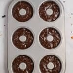 A donut pan filled with batter.