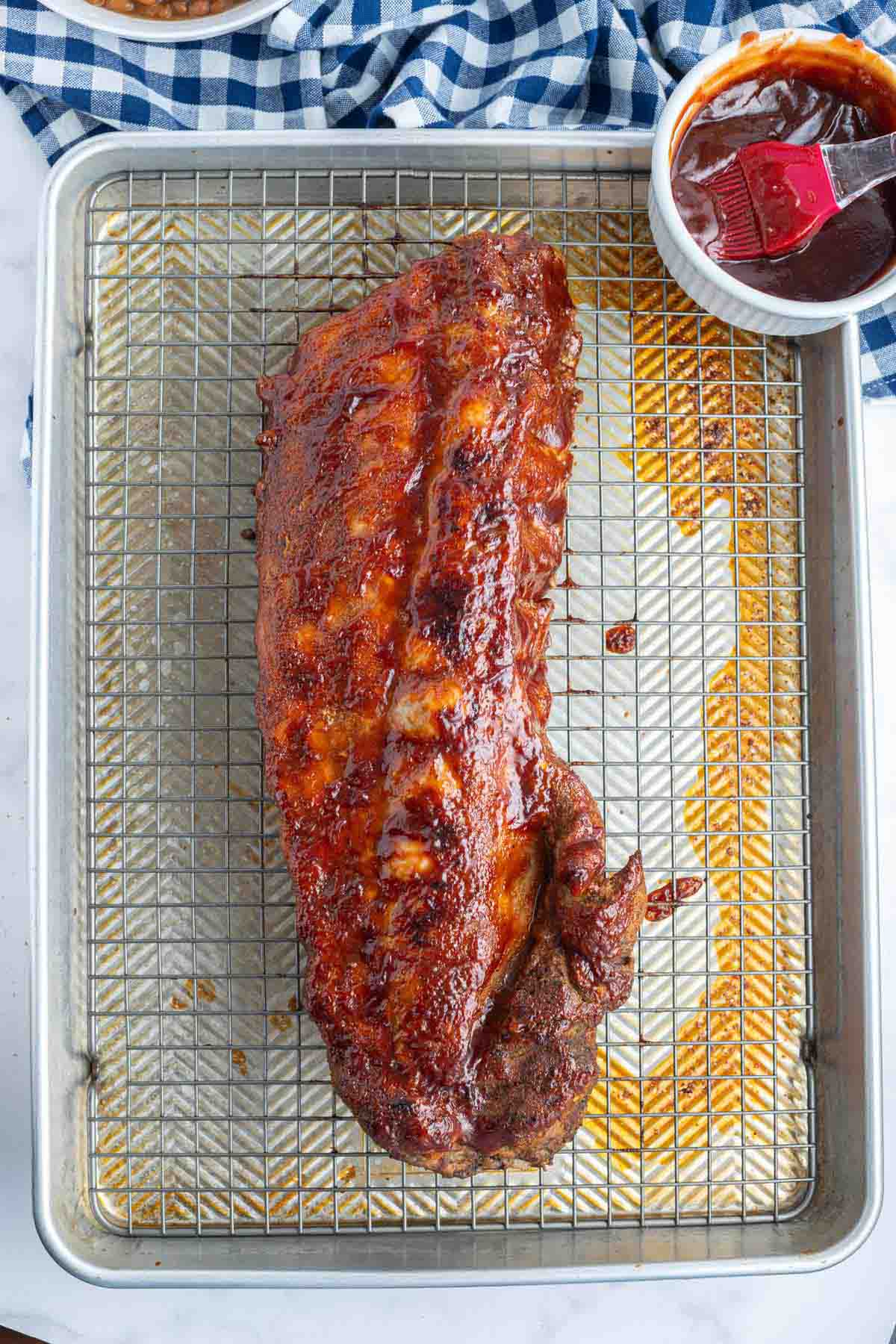 A cooked rack of ribs.