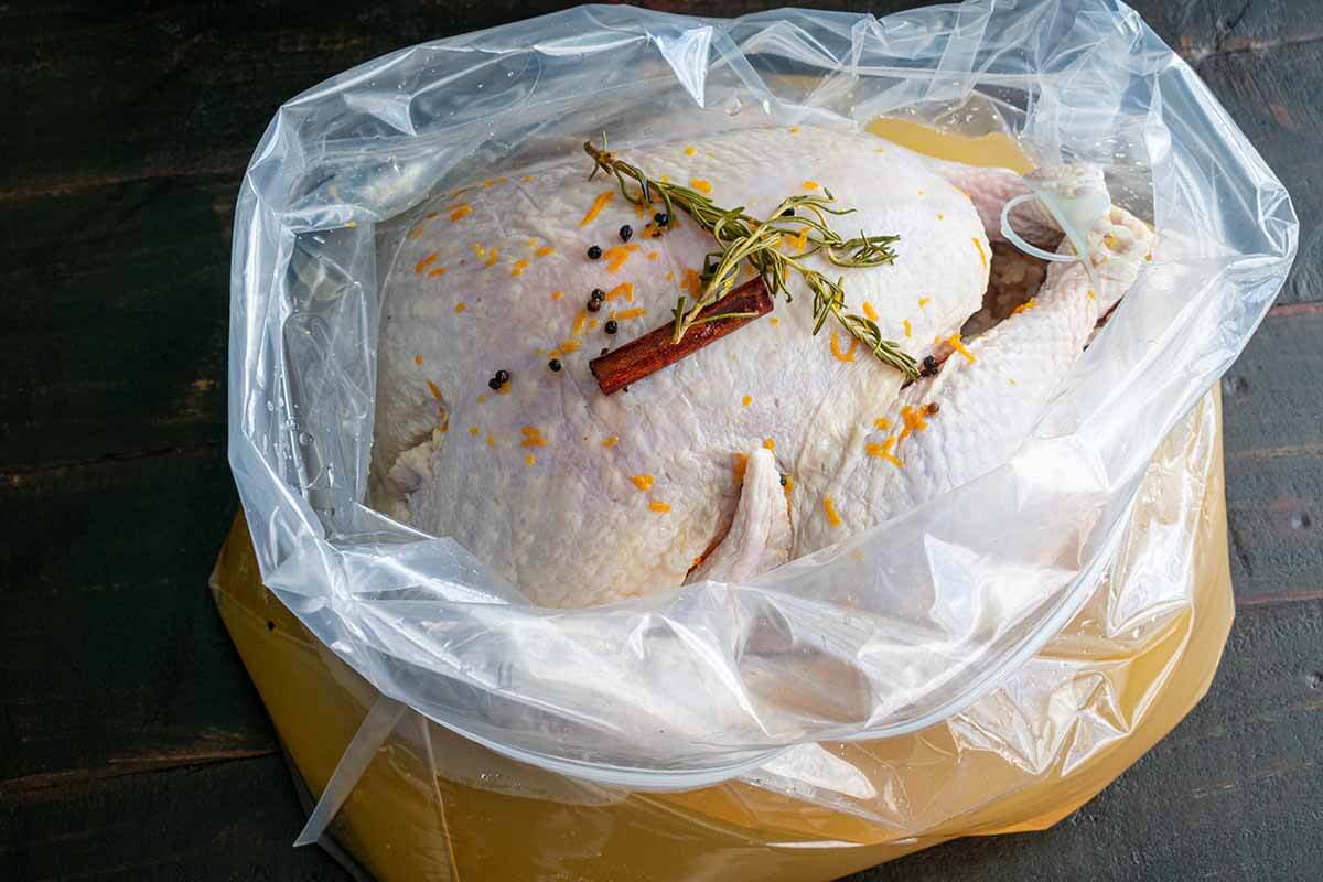 Raw turkey in a brining bag.