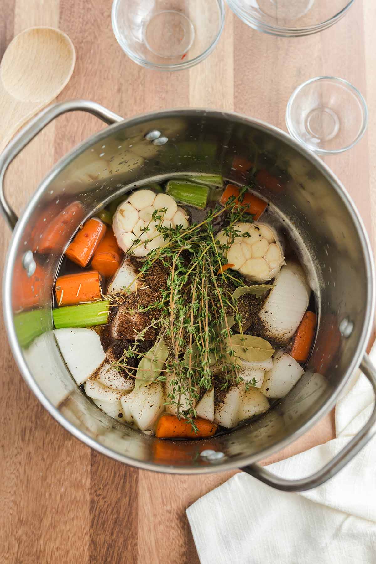 Chopped vegetables and water in a stock pot.