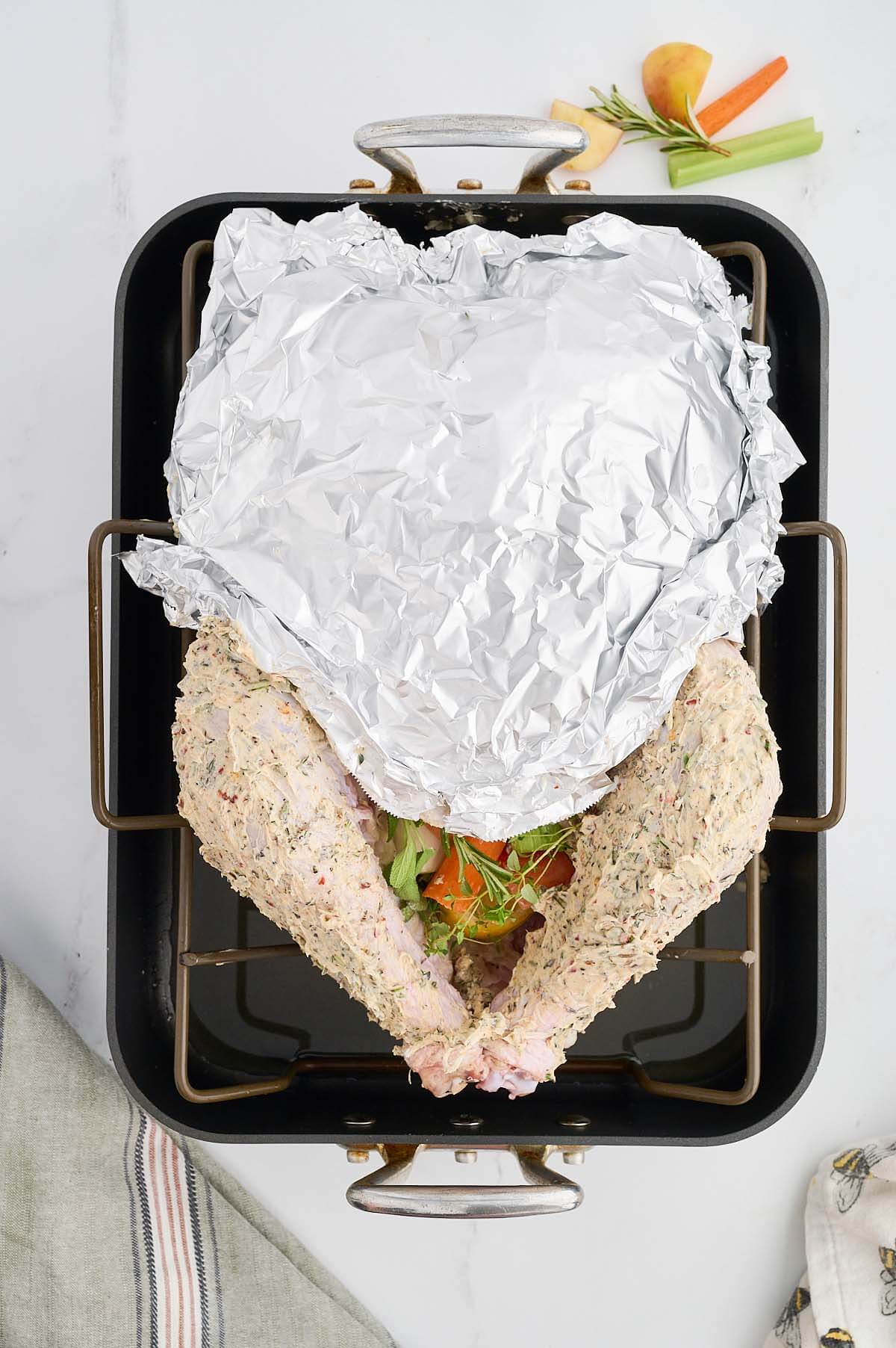 foil covering a turkey breast.