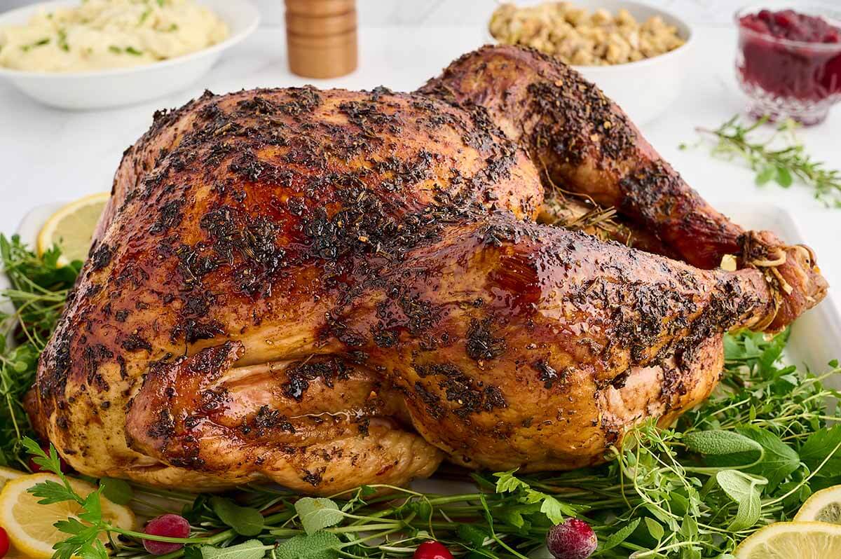 A whole roast turkey on a platter.