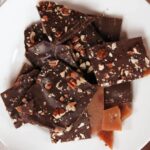 Butter toffee on a white plate. 