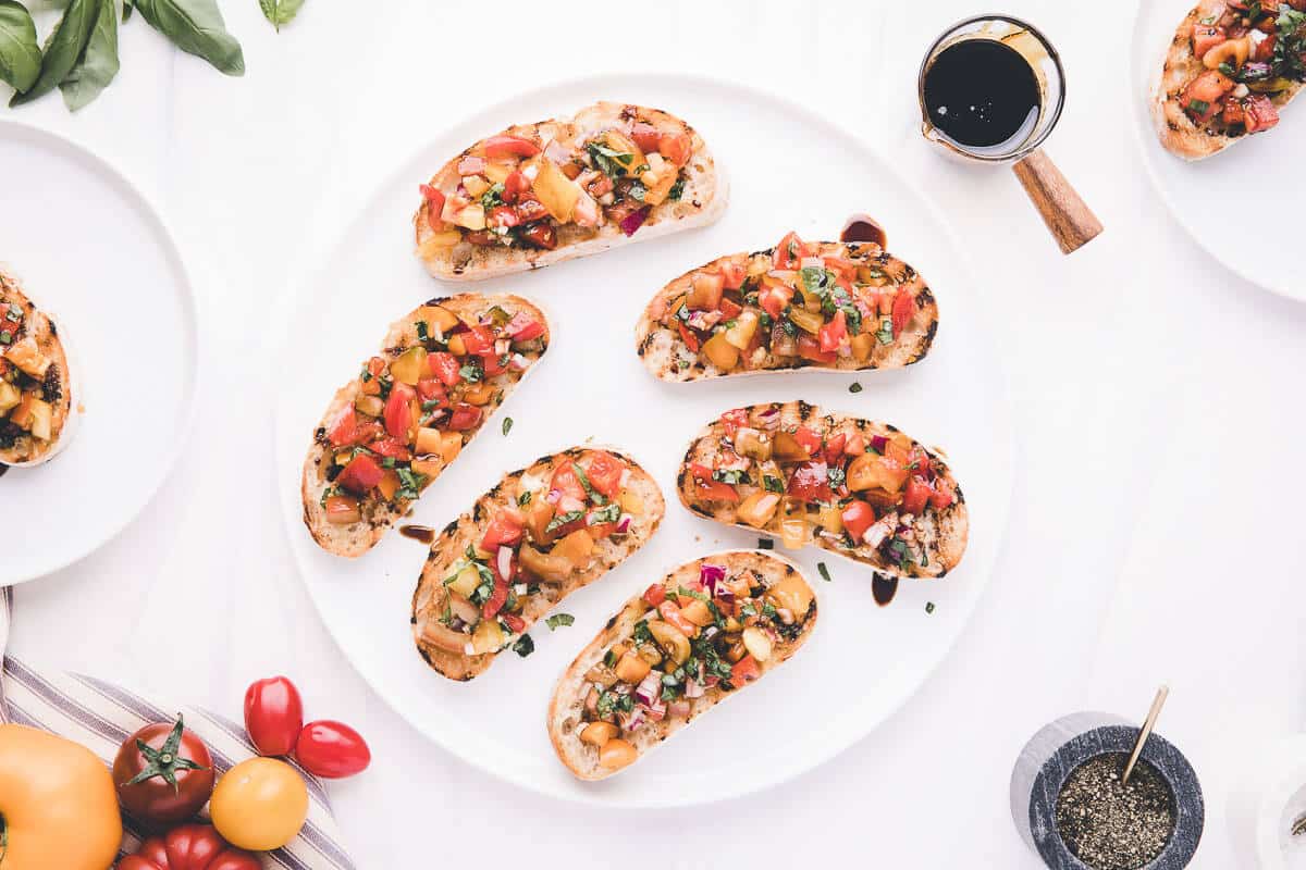Bread with bruschetta on a plate.