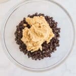 Chocolate chips and cookie dough in a bowl