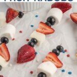 Skewers of strawberries, blueberries, marshmallows, and cake cubes arranged on parchment paper. The heading reads "4th of July Fruit Kabobs," and the bottom section displays the "Southern Plate" logo.